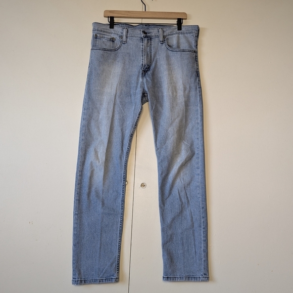Levis Men's 521 Slim Taper Light Wash Jeans Size 34x32 - Picture 1 of 8